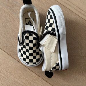 Vans Black and White Checkerboard Slip-On Sneakers
